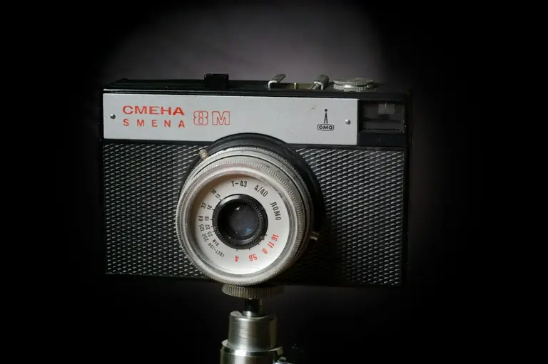 black and silver canon camera